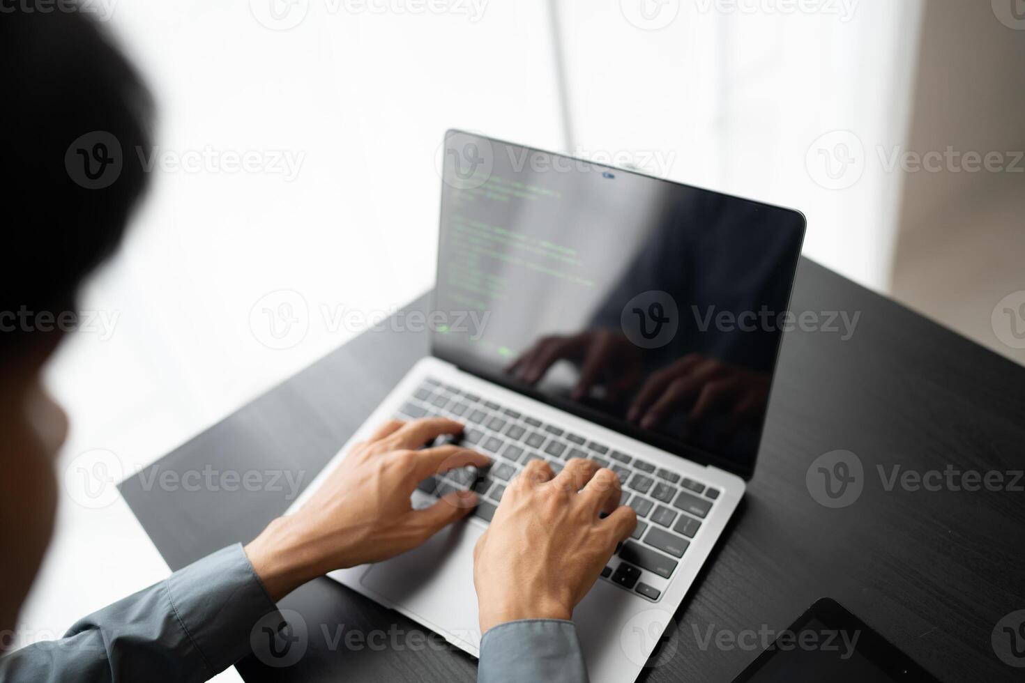 Engineer working with laptop Hands typing keyboard. Professional investor working new start up project. business planning in office. Technology business. photo