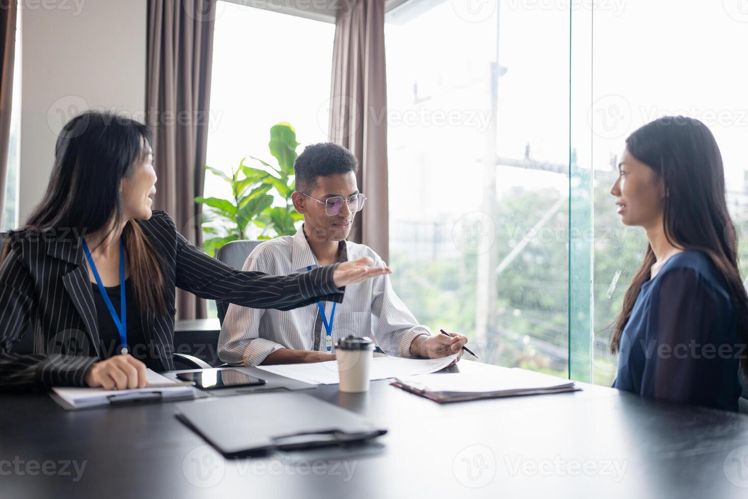 Examiner reading a resume during job interview Business and human resources concept. photo