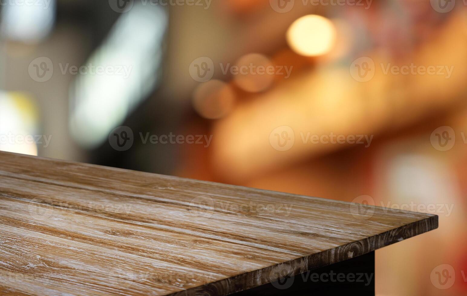 wood table and blur of restaurant background photo