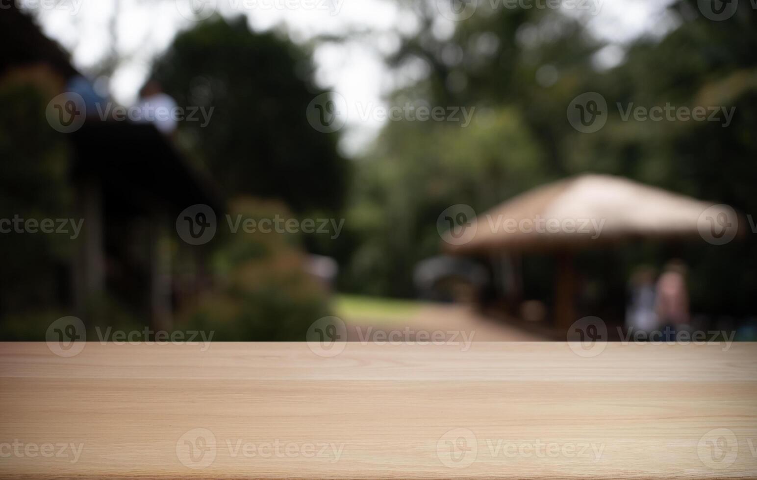Empty wood table and blur of restaurant background selective focus product display photo