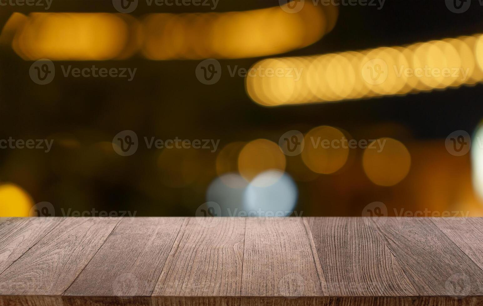 Empty wood table and blur of restaurant background photo