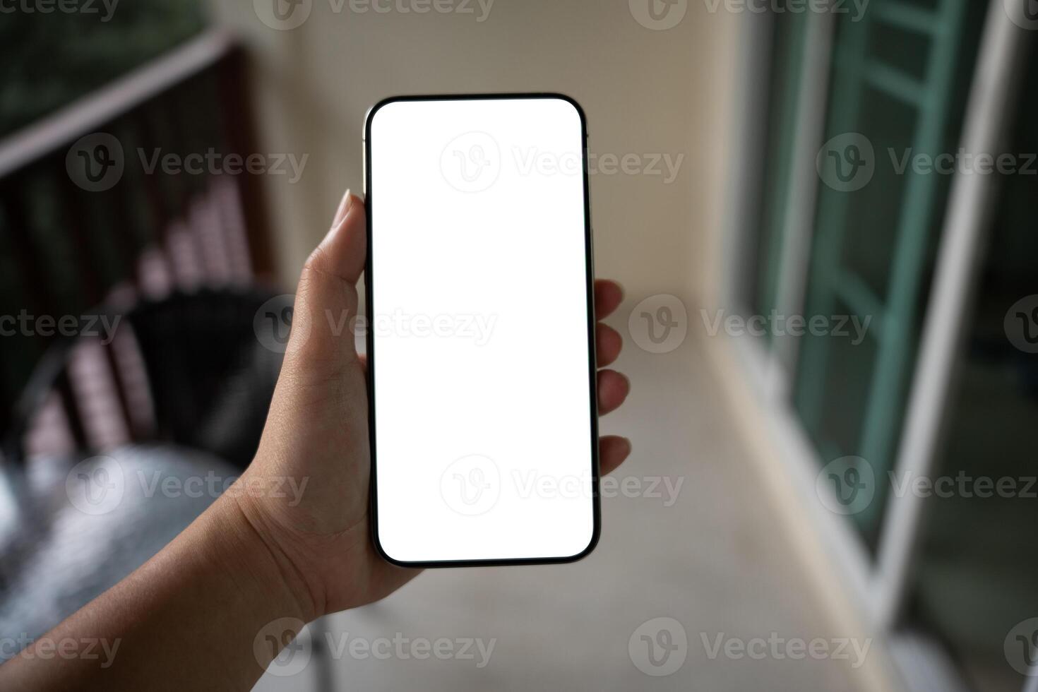 Women hands holding cell telephone blank copy space screen smartphone blank white screen isolated technology concept. photo
