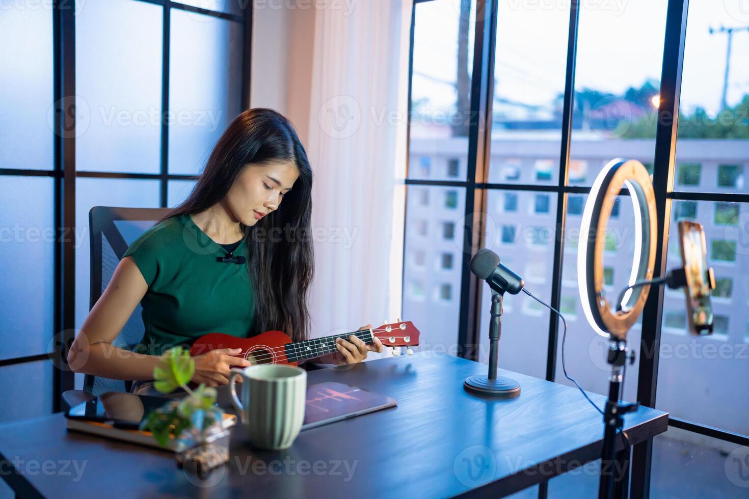 Content creator young asian woman influencer creating content in home studio entertainment and communication blogger vdo record with smartphone for online vlog photo