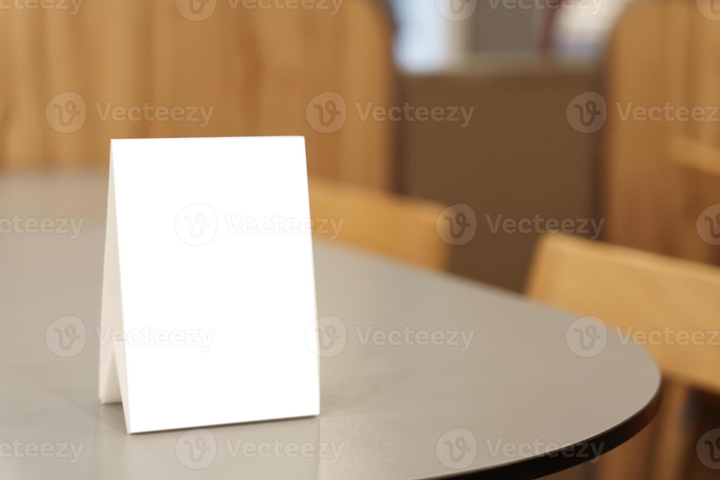 Mock up Menu frame standing on wood table in restaurant space for text photo