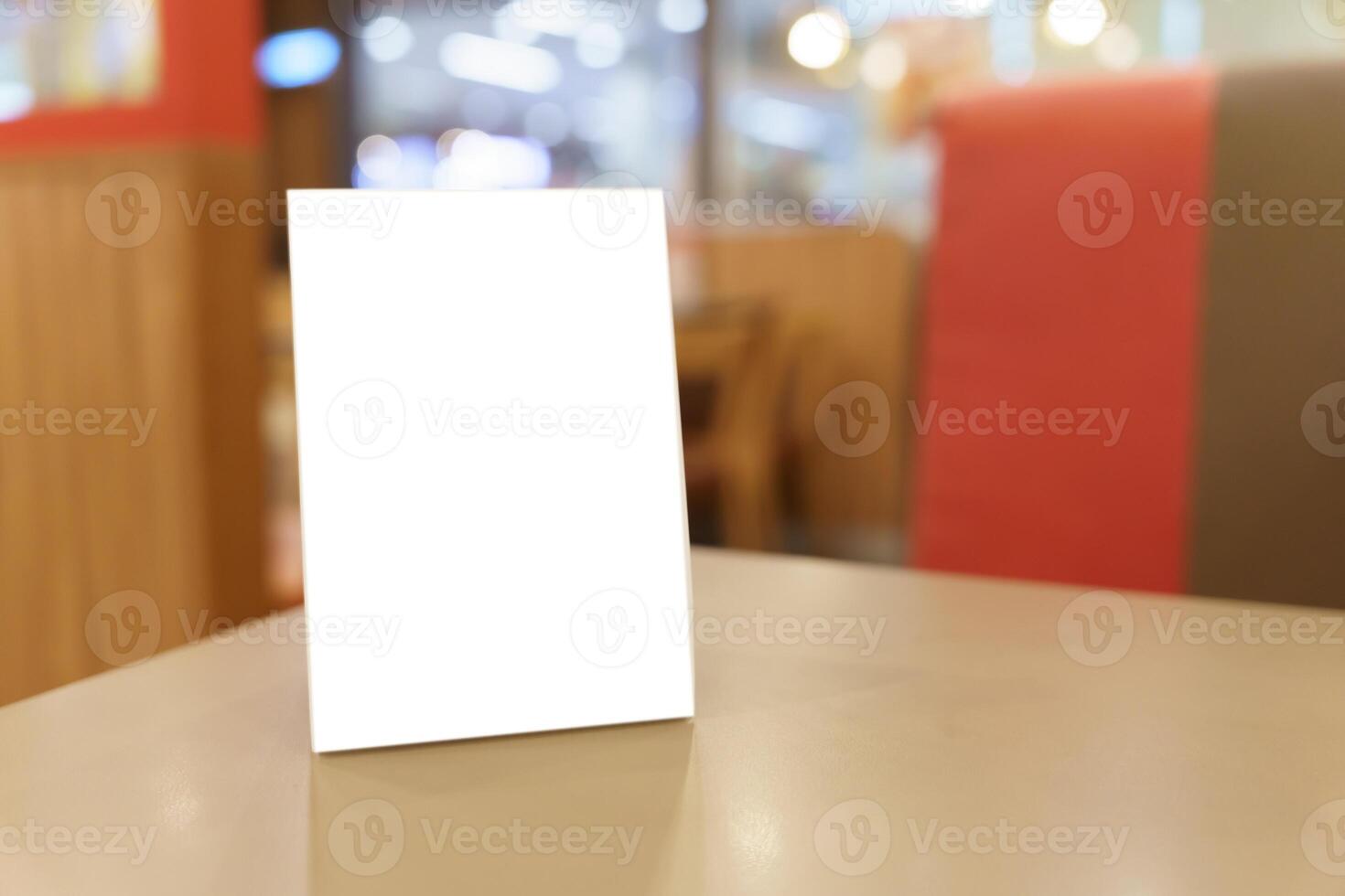 blank white card on table in restaurant photo