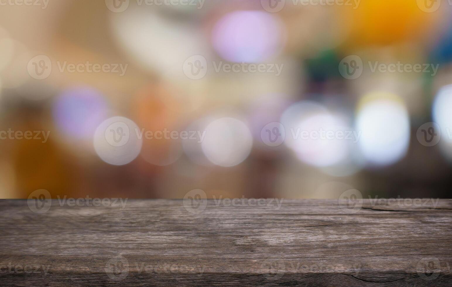 wooden table top with blurred bar counter background photo