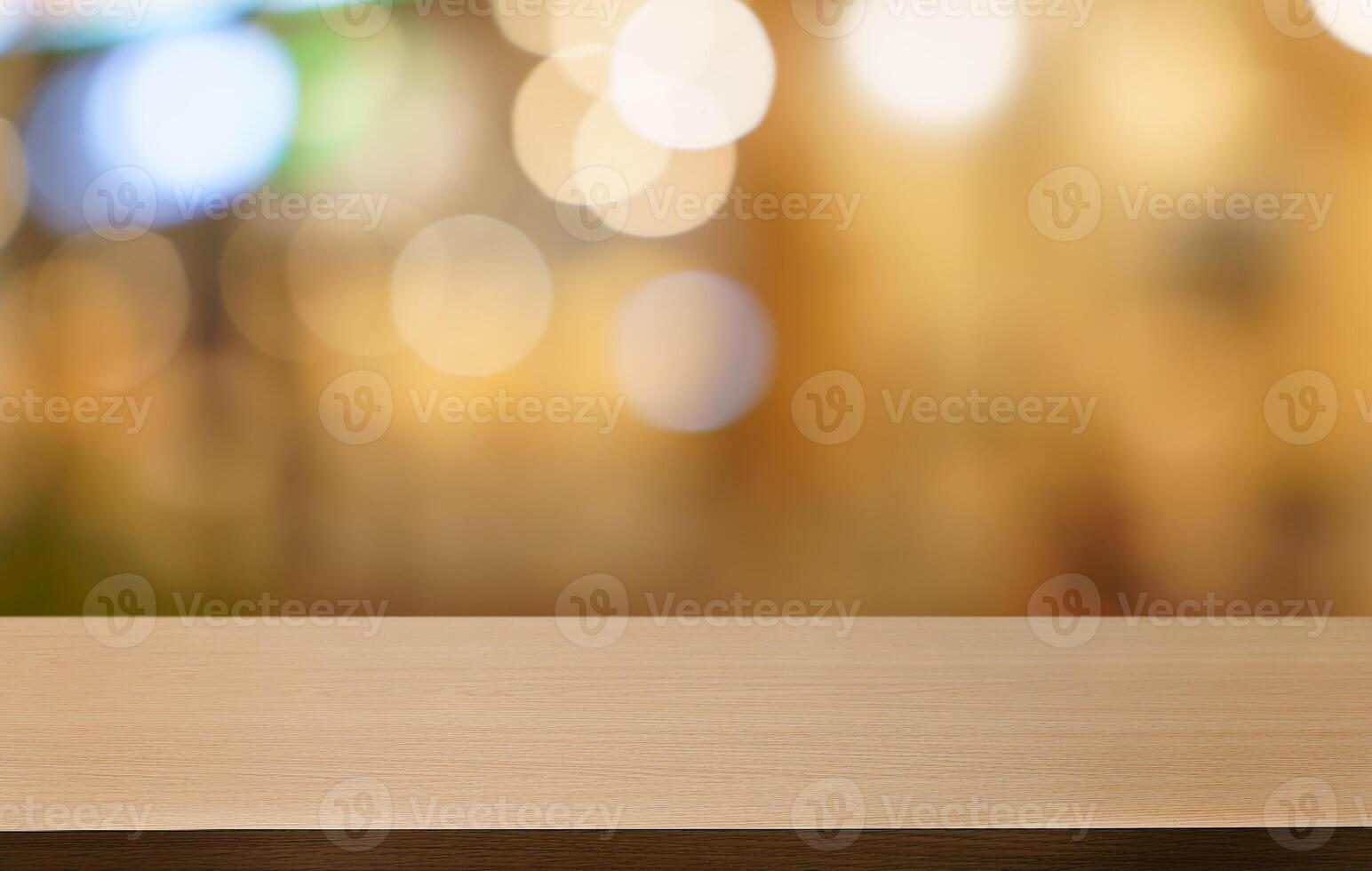 wood table top and blur of restaurant background selective focus product photo