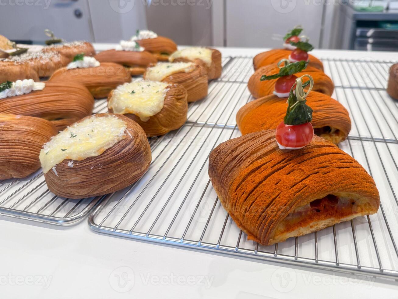 Modern gourmet pastries with tomato decoration. Culinary creativity and premium bakery presentation photo