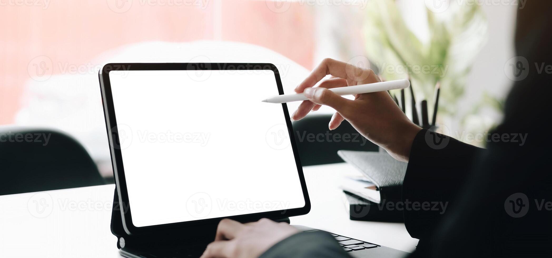 woman hand's using laptop with blank screen on sofa in home. Close up man hand using laptop for work at home. photo
