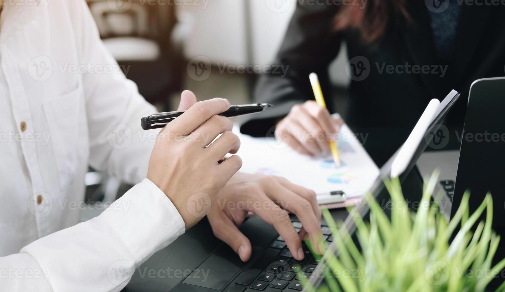 Business people meeting to discuss the situation on the market in a morning. Analyzing marketing data for start up new business project. Top view photo