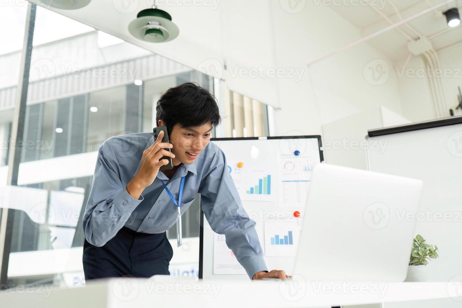 Business Professional on Phone Call. Engaged businessman discussing strategies during a meeting. photo