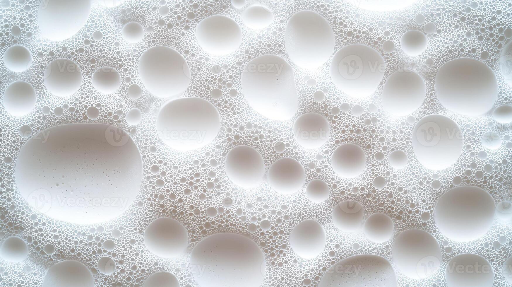 Microscopic white and bubbles creating textural pattern, suggesting purity graphic softness in foam cleaning, and skincare, design contexts photo