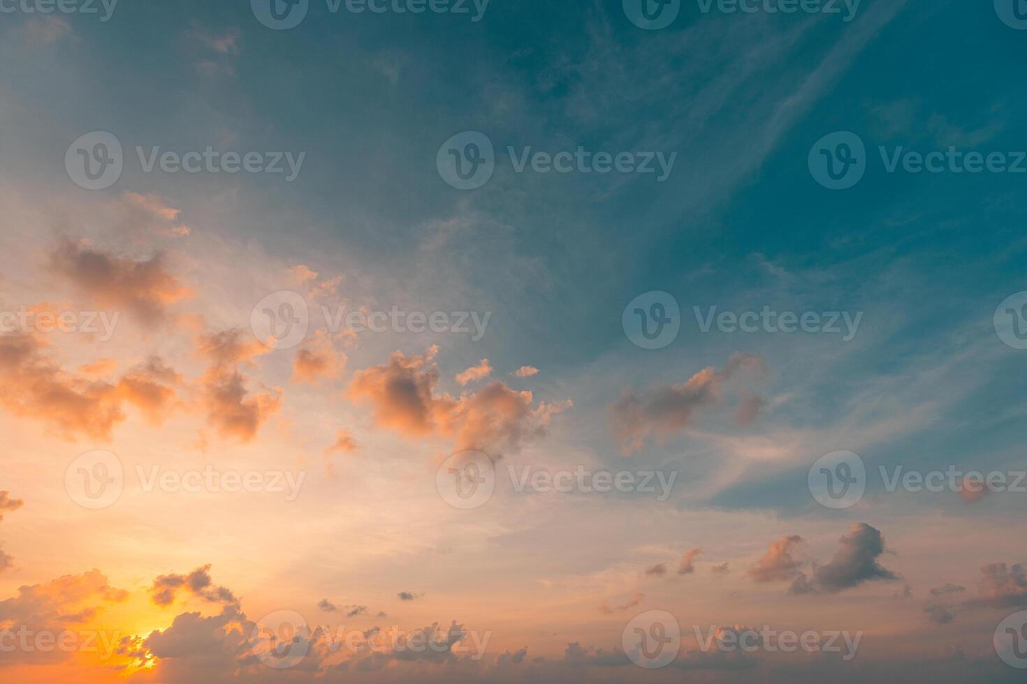 Majestic sunset sky with vibrant clouds painting a dreamy landscape that inspires tranquility. Inspirational nature background, relaxing peaceful wallpaper, skyline photo