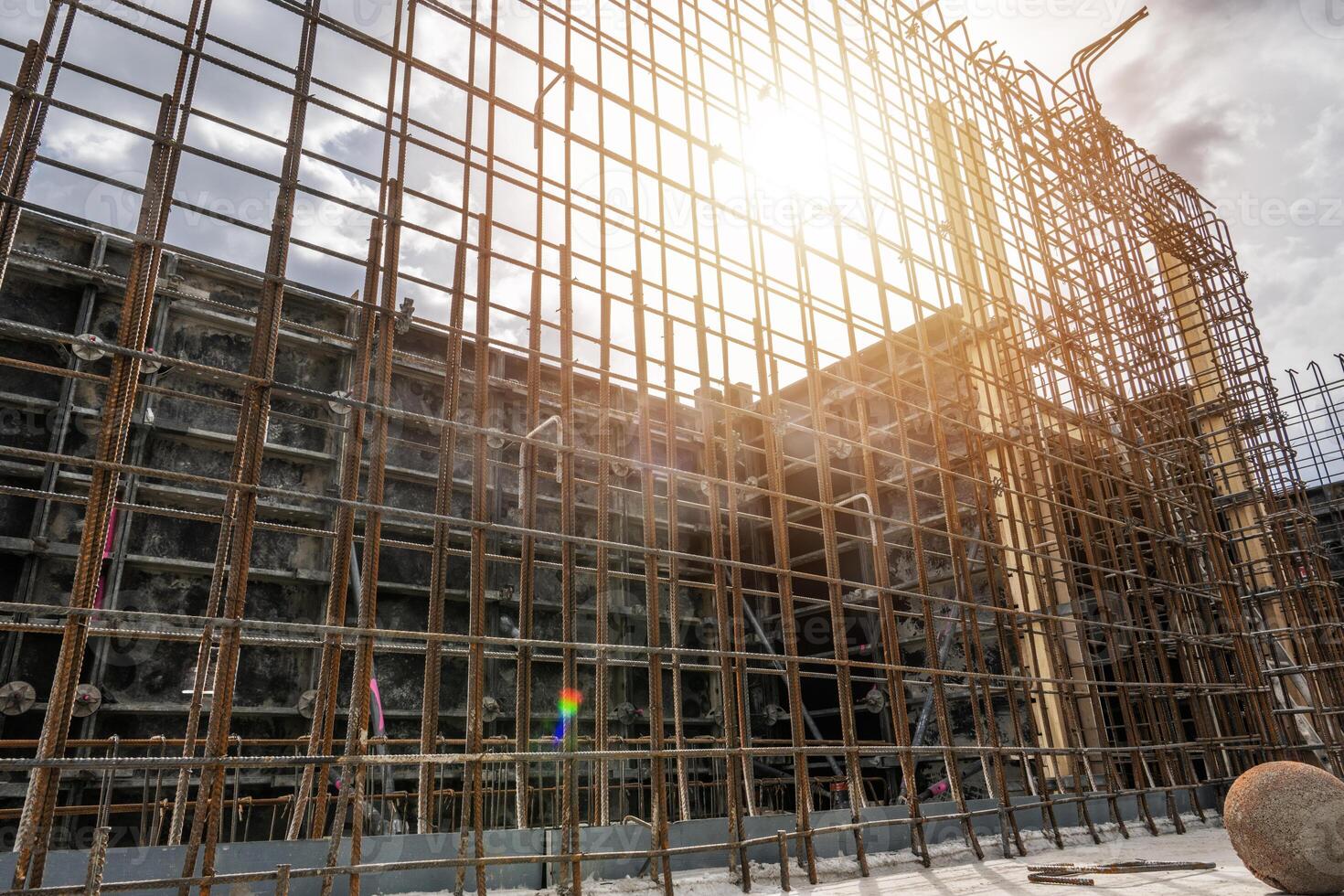 Construction Site With Steel Framework Under Sunny Sky photo