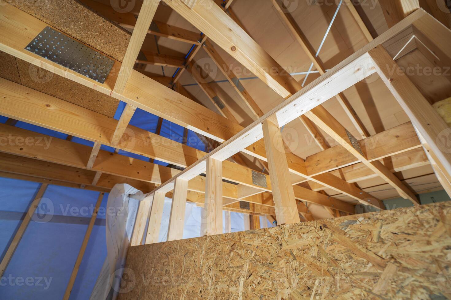 Construction of a Wooden Framework in a House Under Renovation photo