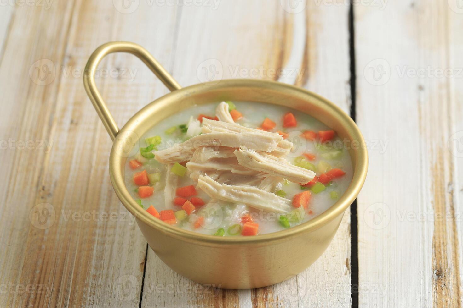 Korean Dakjuk Porridge, Chicken Congee with Shredded Chicken, Carrot, and Spring Onion photo