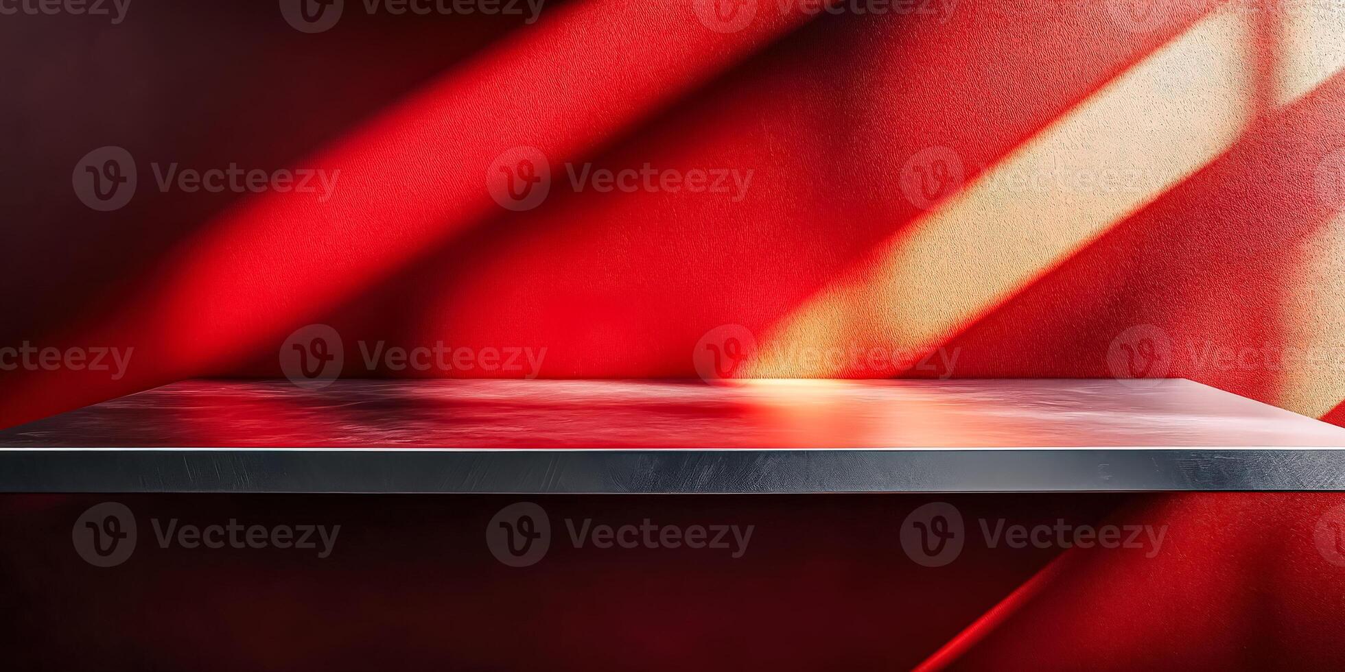 Shelf with a red background and a silver surface photo
