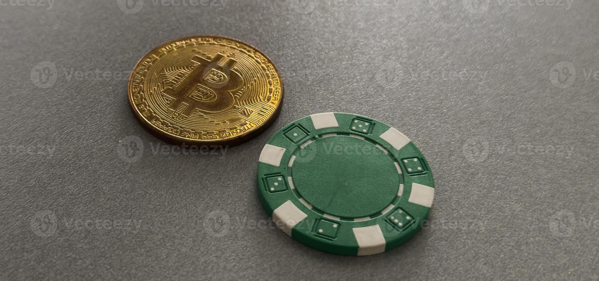 Bitcoin gold coin with poker chips on a green poker table against black background. Blockchain casino. Online gambling. photo