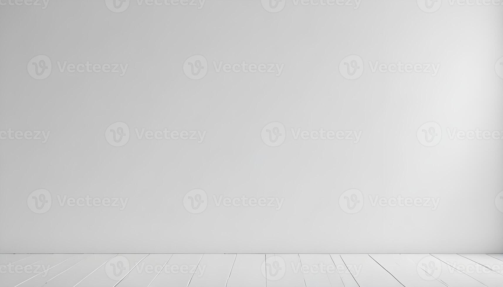 A bright, minimalistic scene features a white wall and wooden floor in a clean space. photo