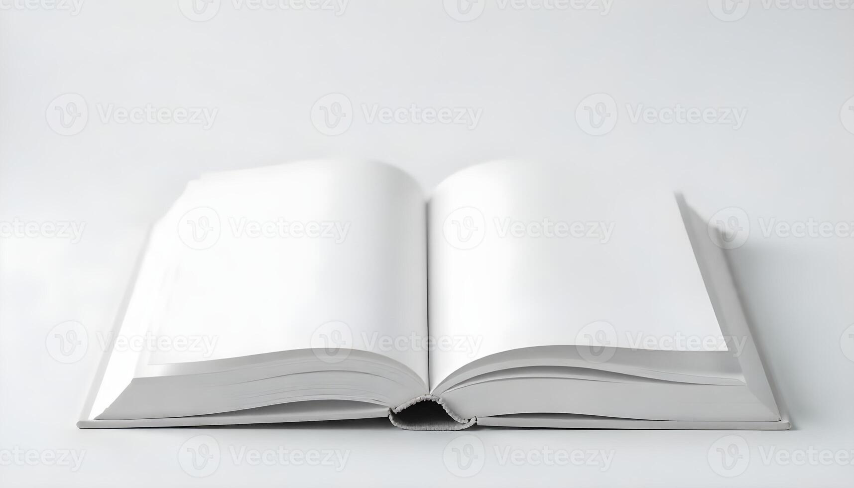 An open book with blank pages lies flat against a simple white background, ready for use. photo