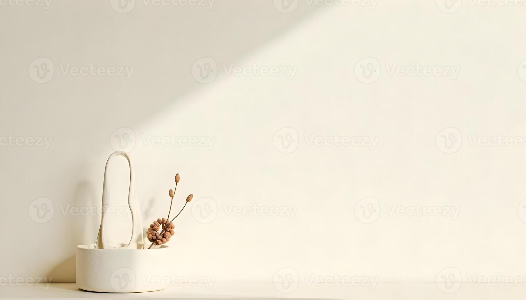 A minimalist white bag filled with dried flowers is presented in a peaceful and stylish composition. photo