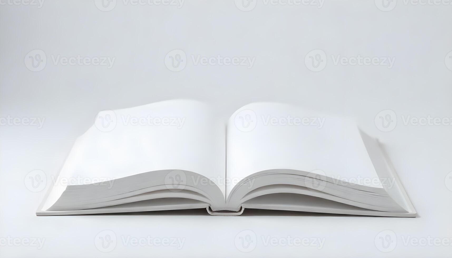 An open book, showcasing pristine white pages ready for content on a seamless backdrop. photo