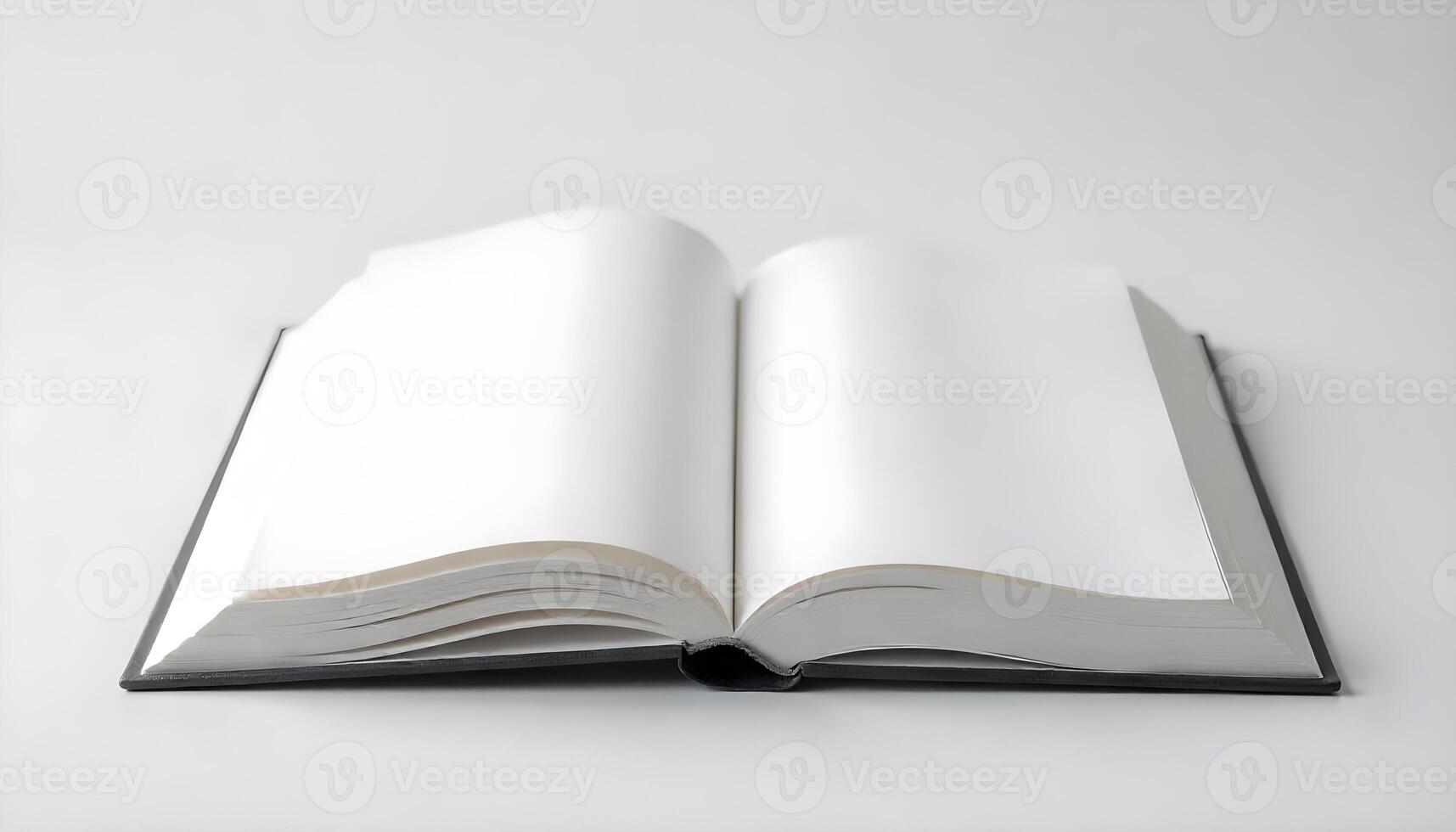 An open hardcover book with blank white pages sits on a plain white surface, ready. photo