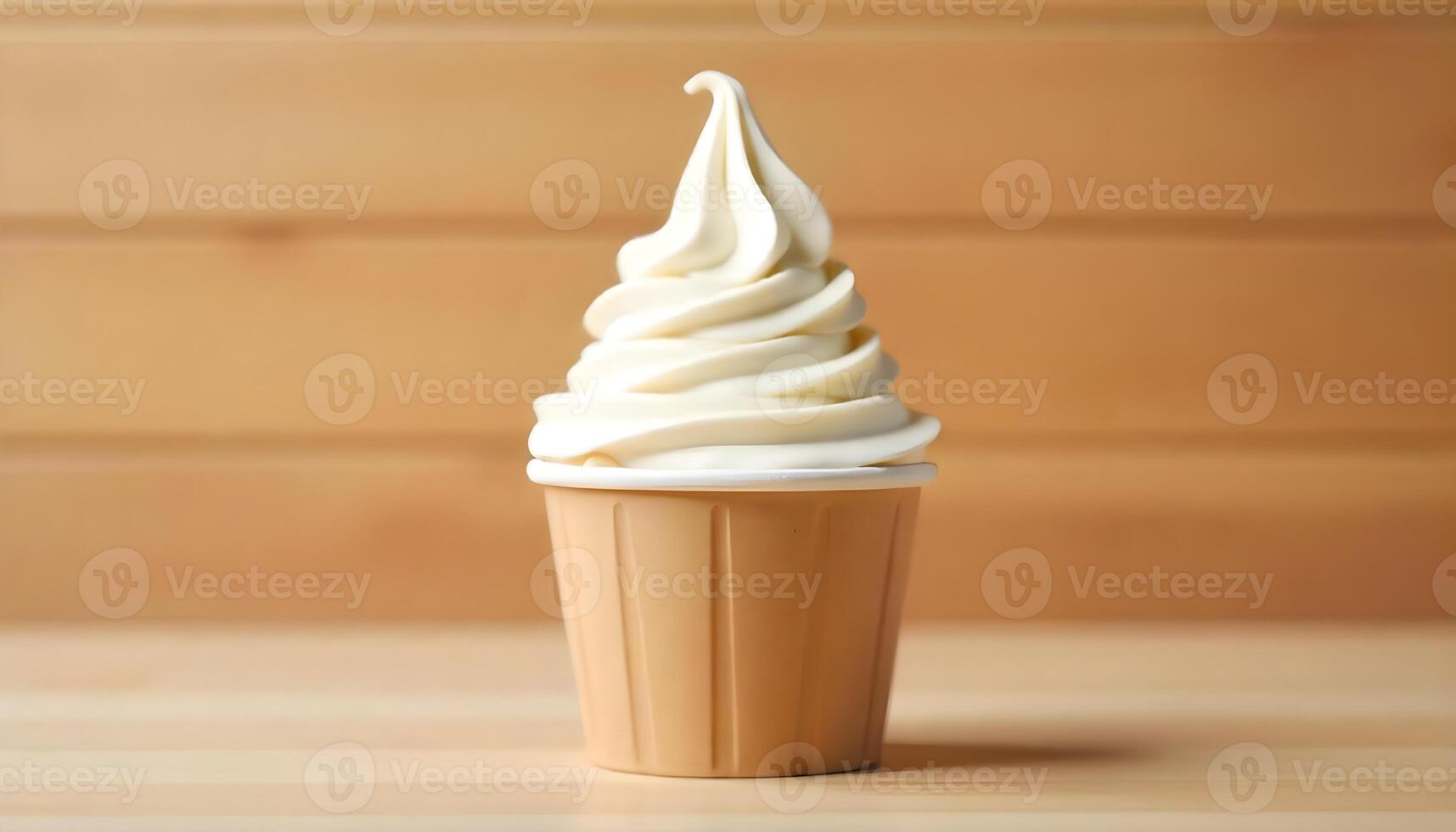 A creamy, swirled soft serve ice cream in a paper cup, ready to be enjoyed. photo