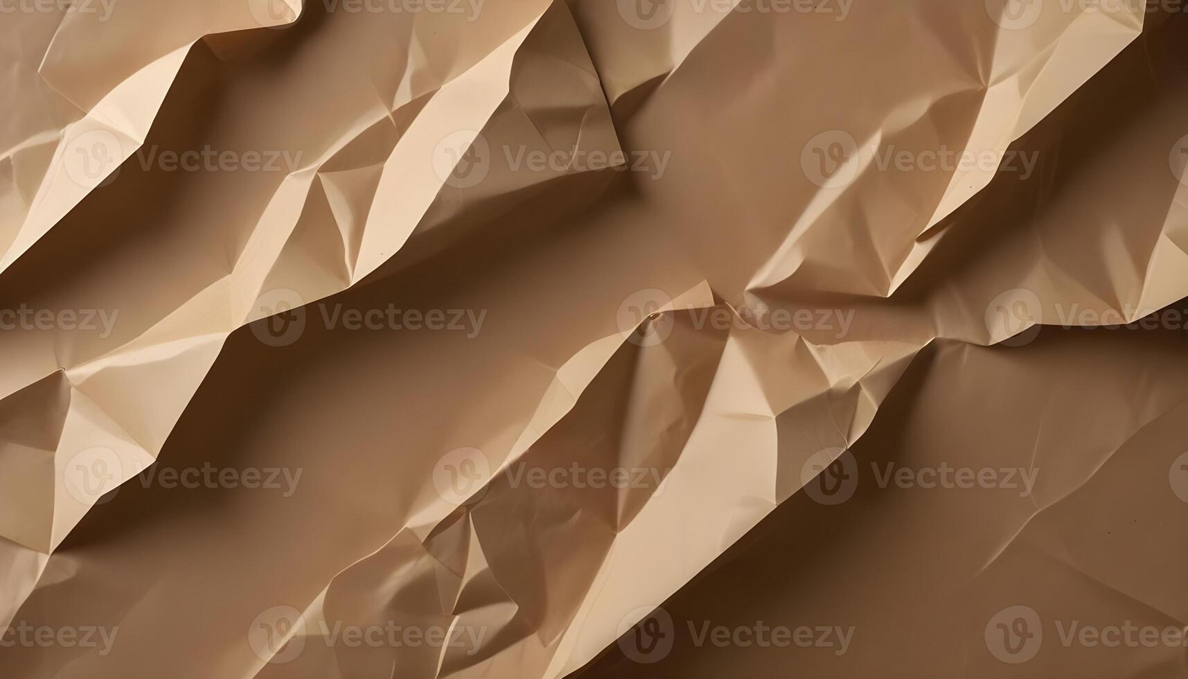 A close-up shot reveals a textured paper surface with intricate folds and a warm color. photo