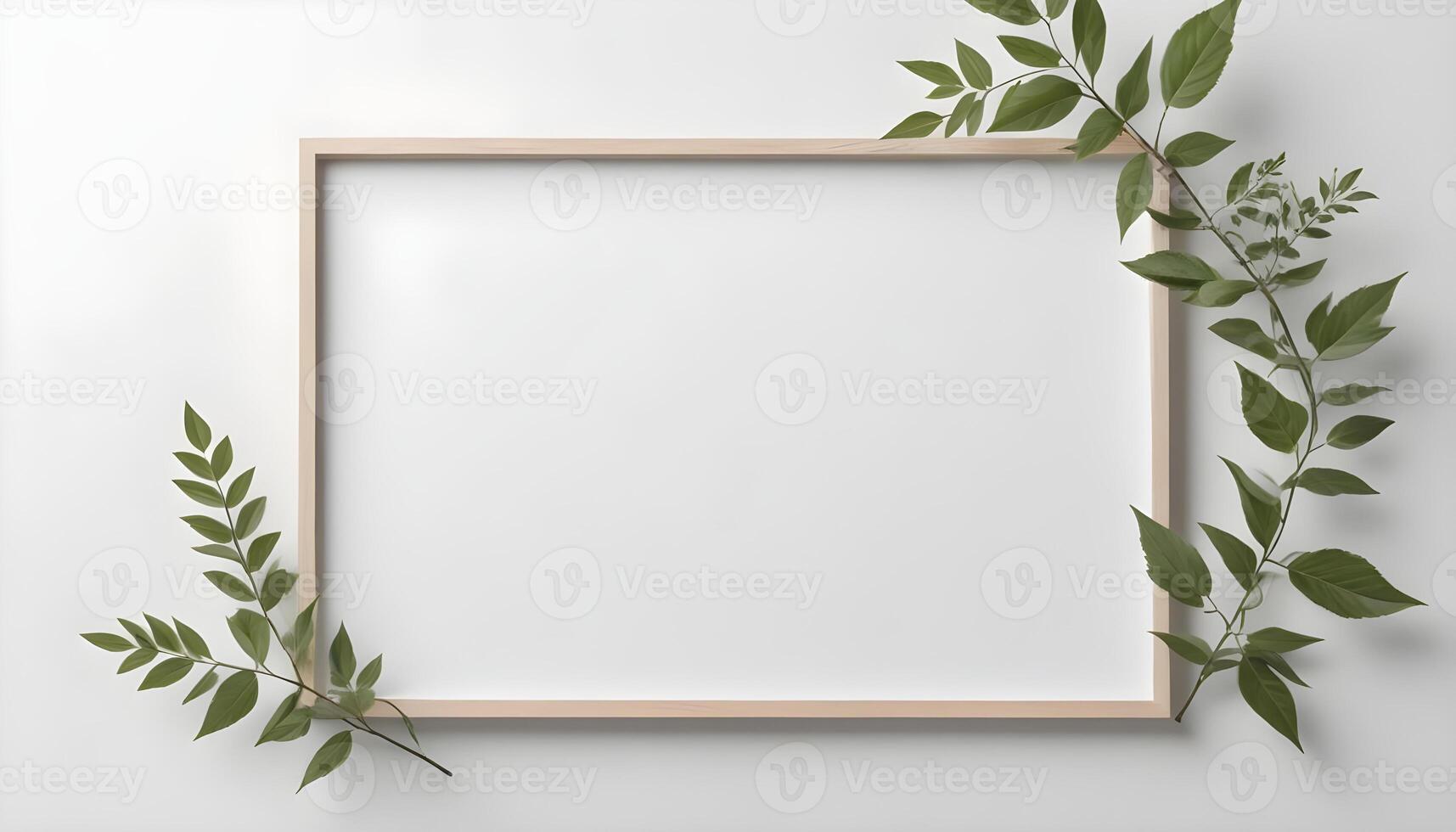 A minimalist wooden frame decorated with fresh green leaves against a pristine white background. photo