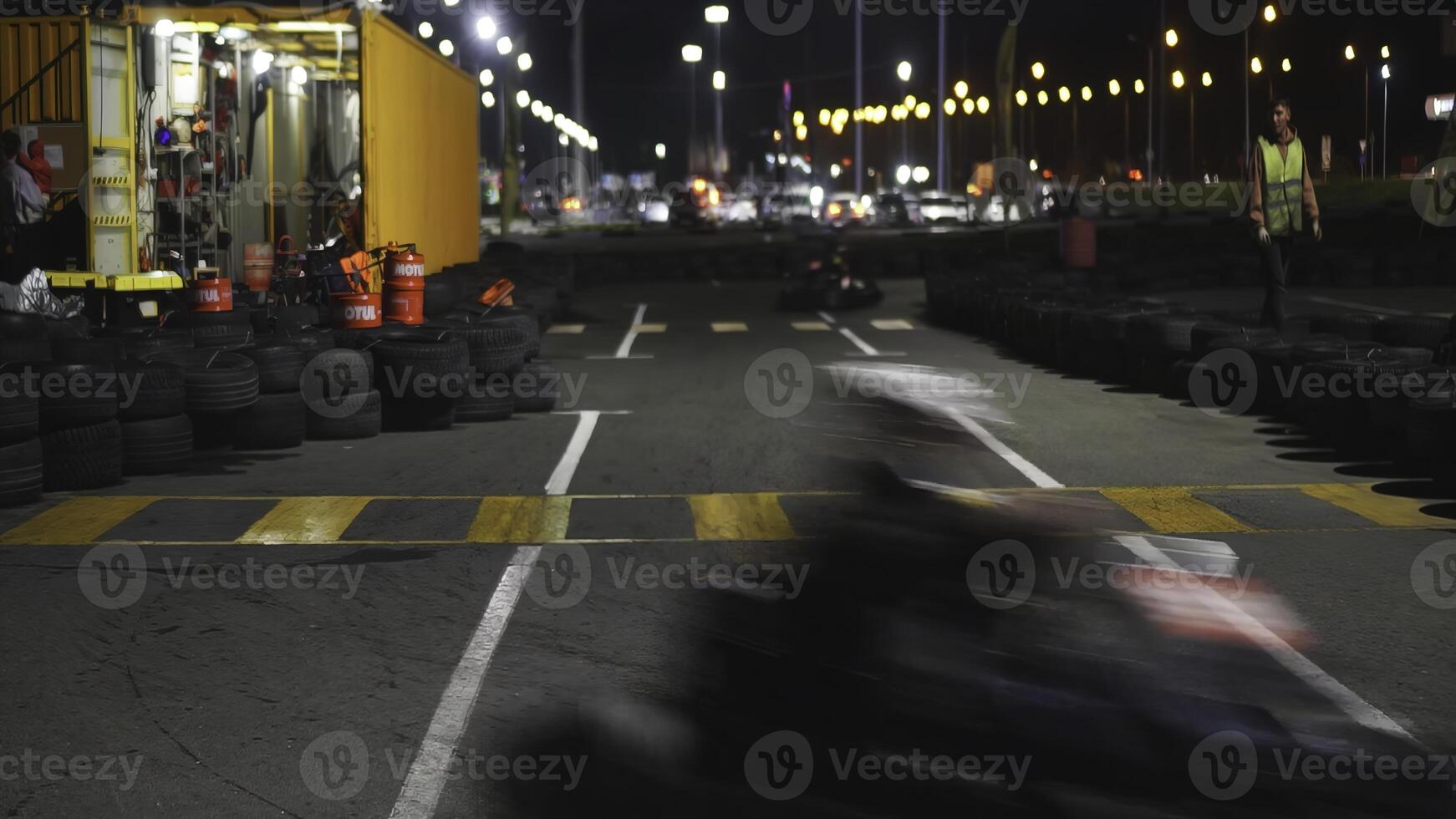 Exciting Nighttime GoKart Racing Takes Place on an Adventurous OffRoad Track Setting. Media photo