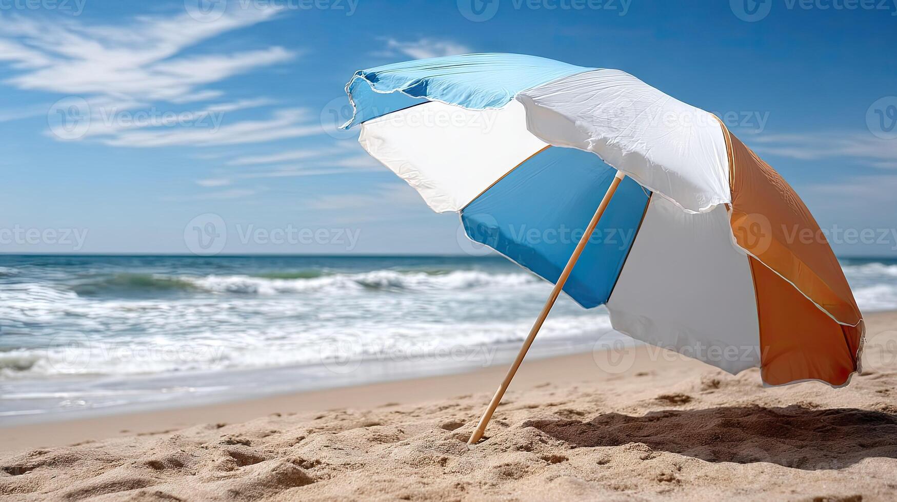 An umbrella on the beach photo
