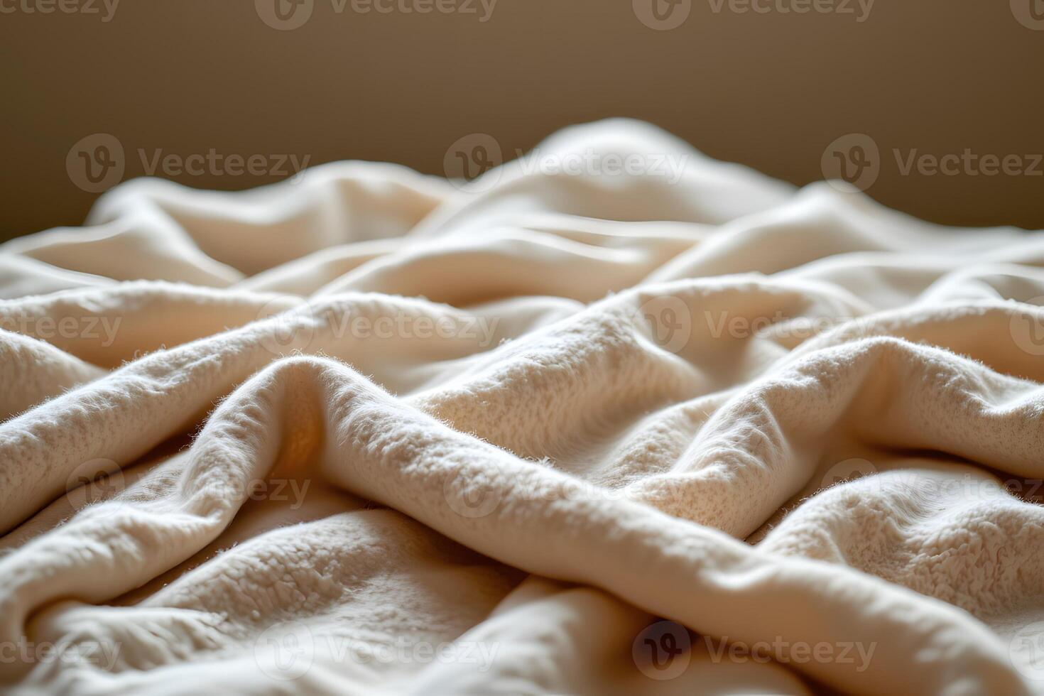 Soft Cream Colored Plush Blanket Texture Cozy Warm and Luxurious Fabric Drape photo