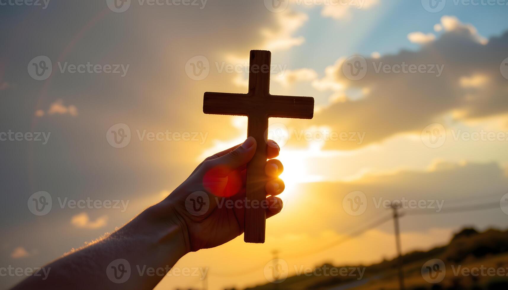 Hand Holding Wooden Cross Silhouette at Sunset Hope Faith Belief Spiritual photo
