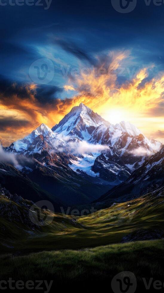 A beautiful mountain landscape with a sunset over it photo