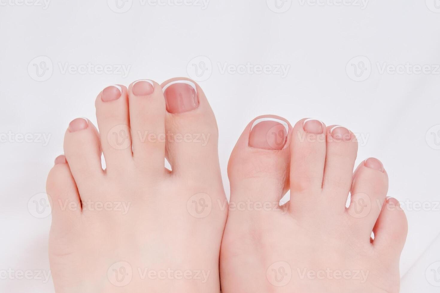 female feet with beautiful pedicure photo