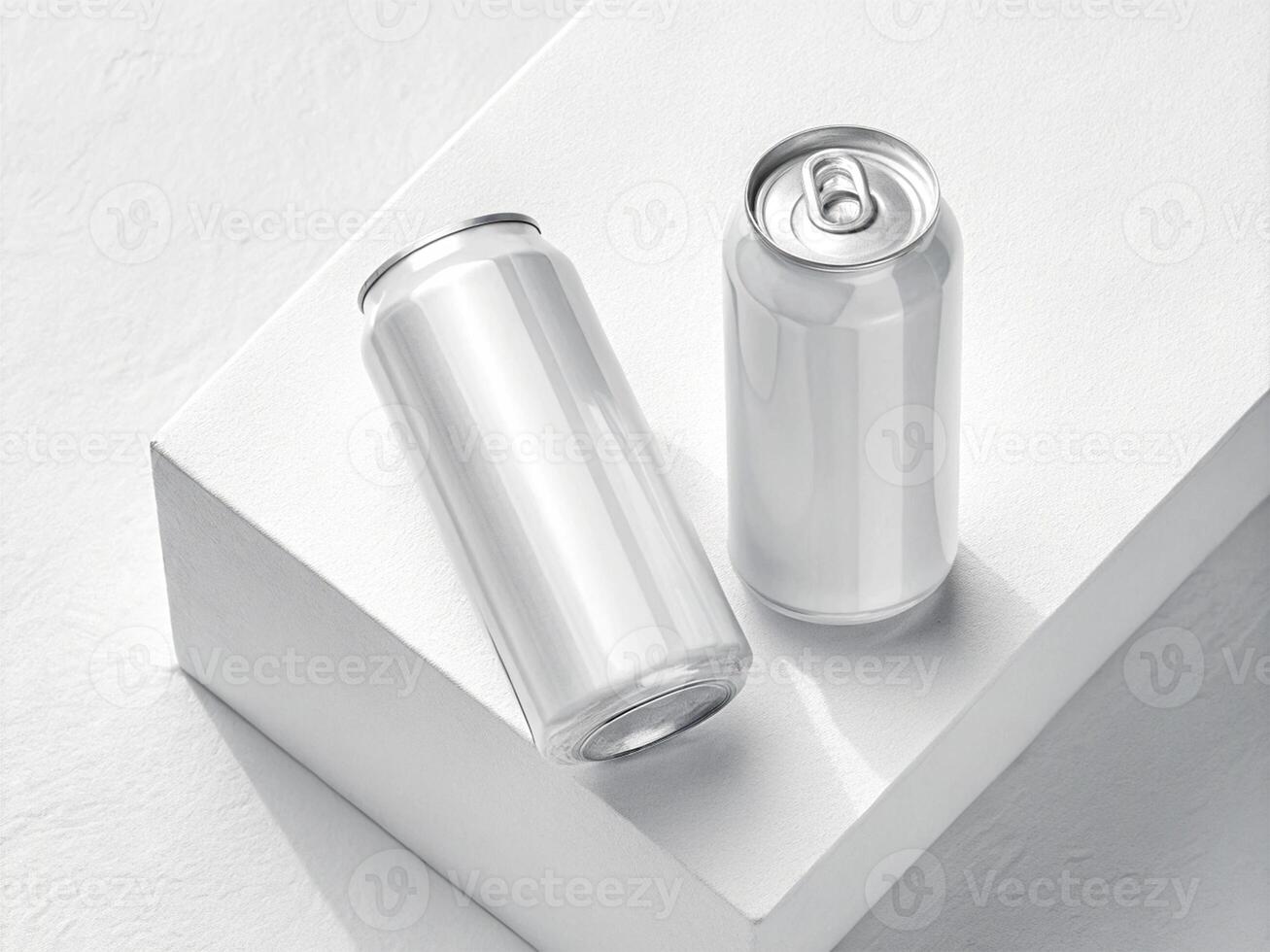 Two blank aluminum cans placed on a white textured surface, one standing upright and the other lying horizontall -Minimalist Beverage Packaging Concept photo