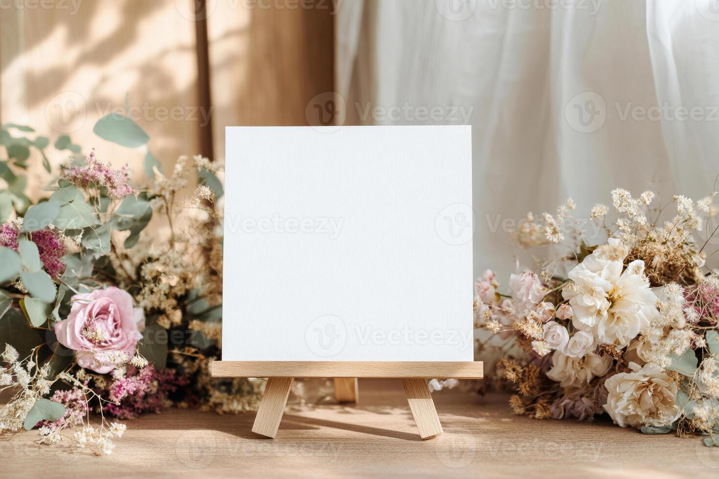Square Canvas on Easel Displayed with Floral Arrangement for Art, Mockup and Design Project photo