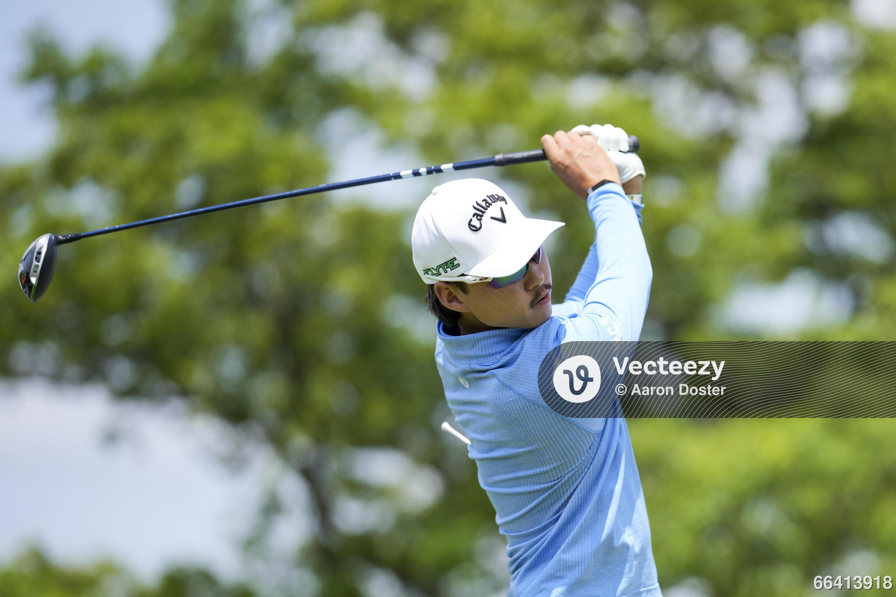 Min Woo Lee plays his shot from the first tee during the third round of
