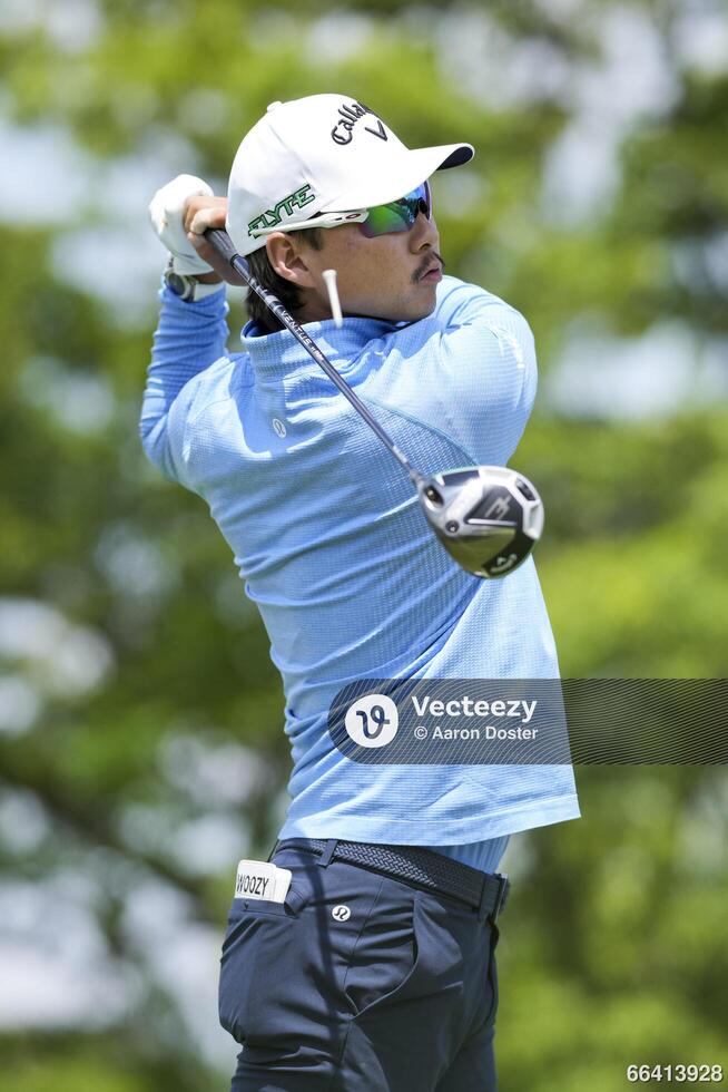 Min Woo Lee plays his shot from the first tee during the third round of