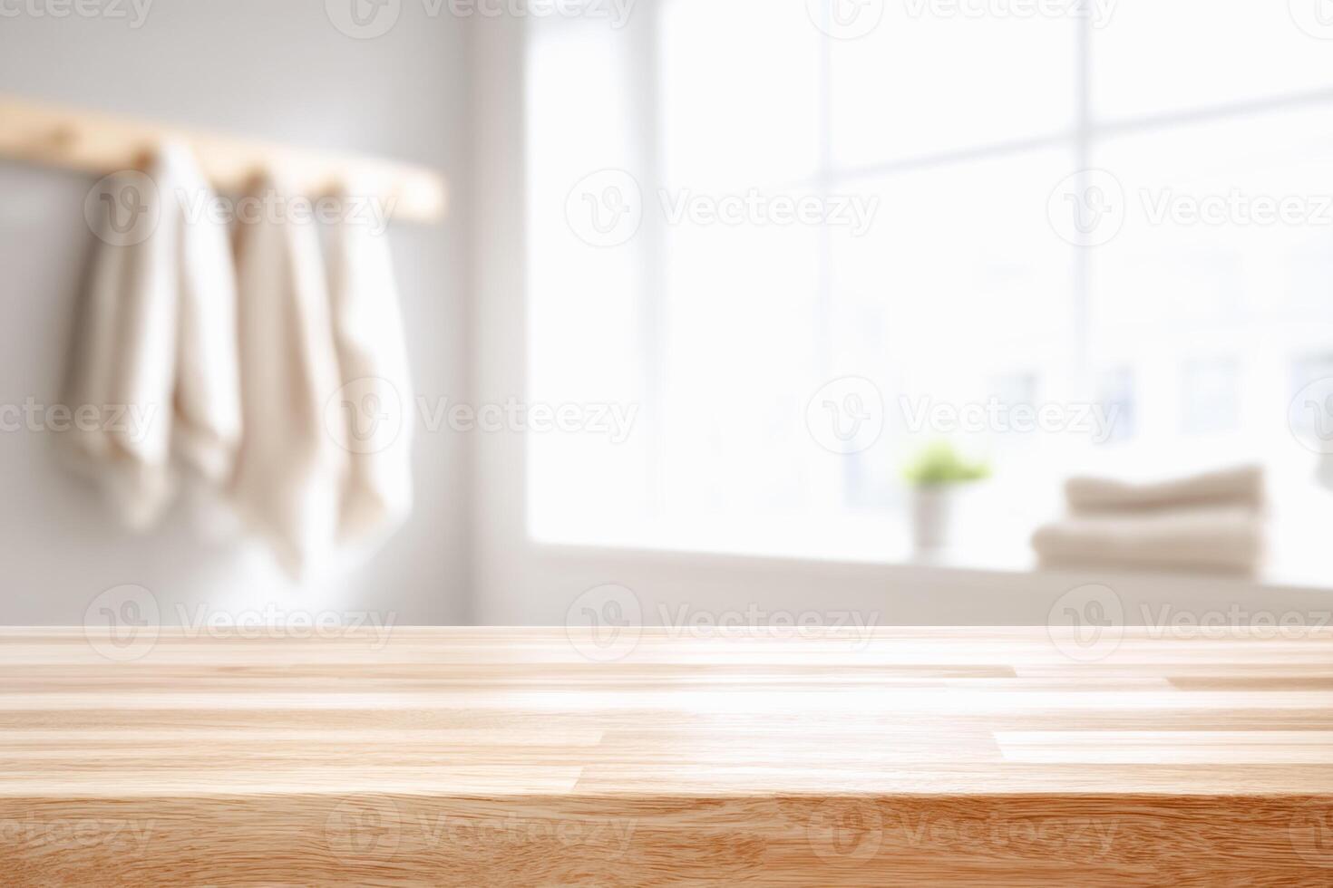 Wooden countertop space in a bright bathroom setting, ideal for product display or presentation photo