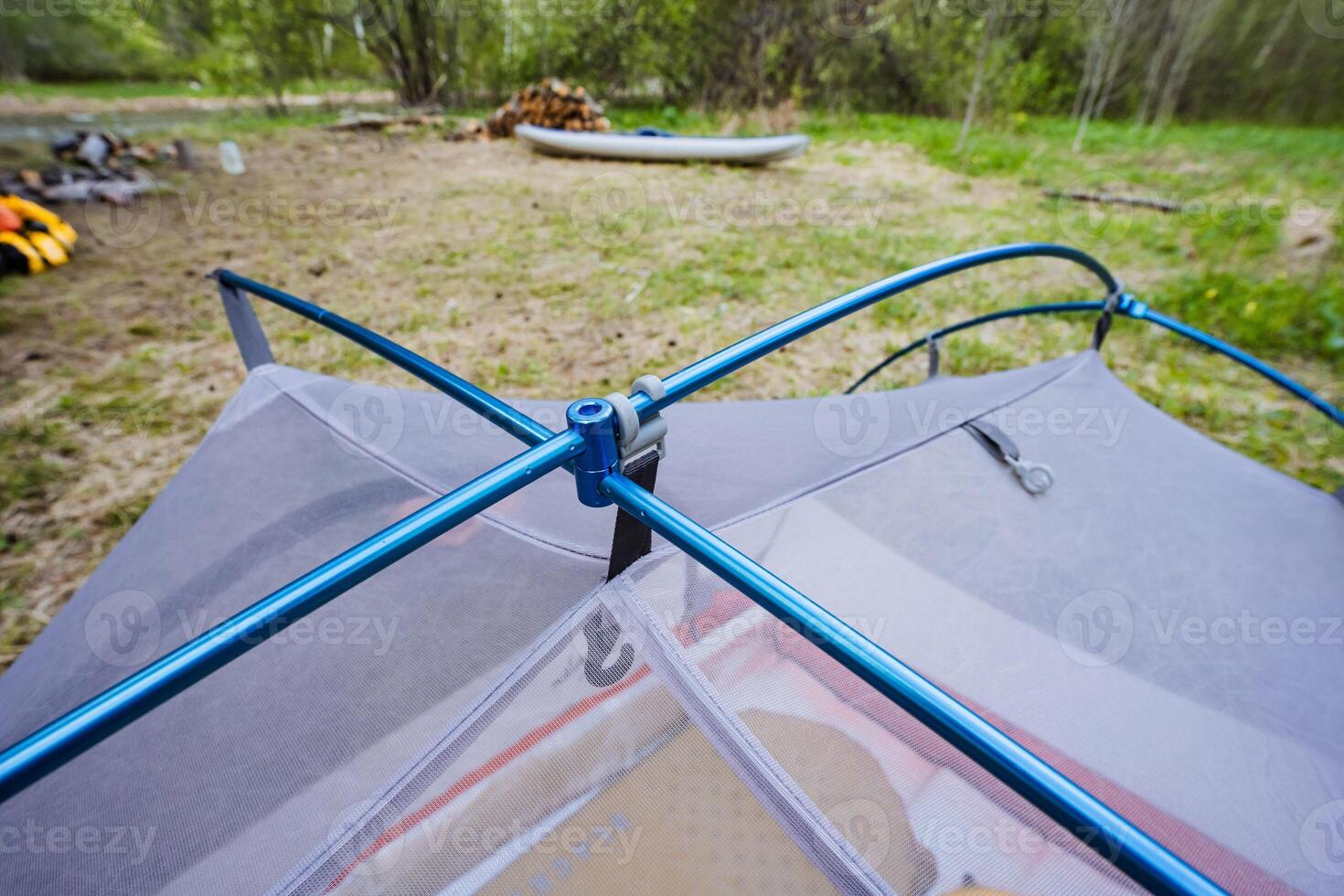 CloseUp of Camping Tent Frame in Natural Setting photo