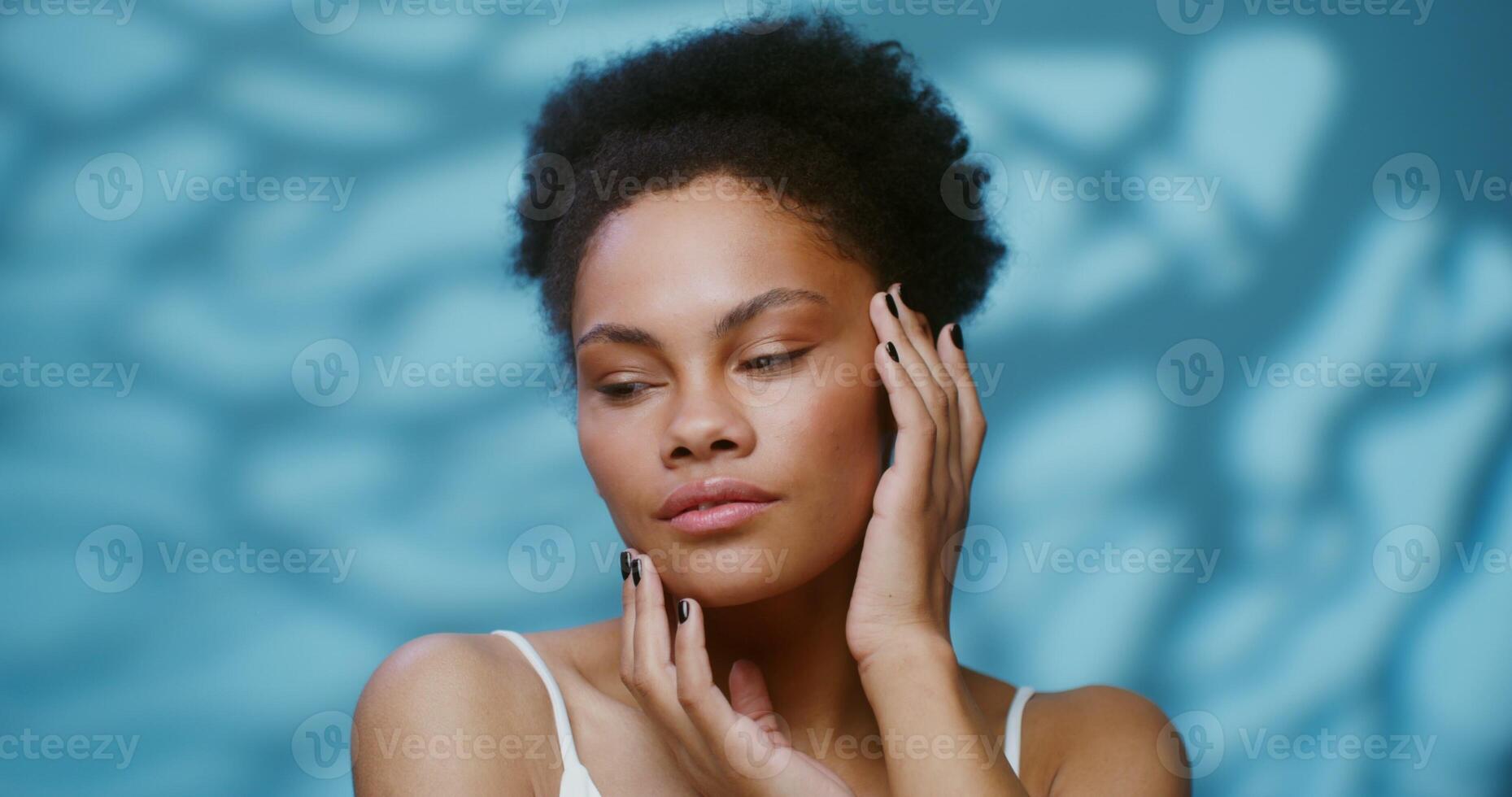 A woman with her hands on her face photo