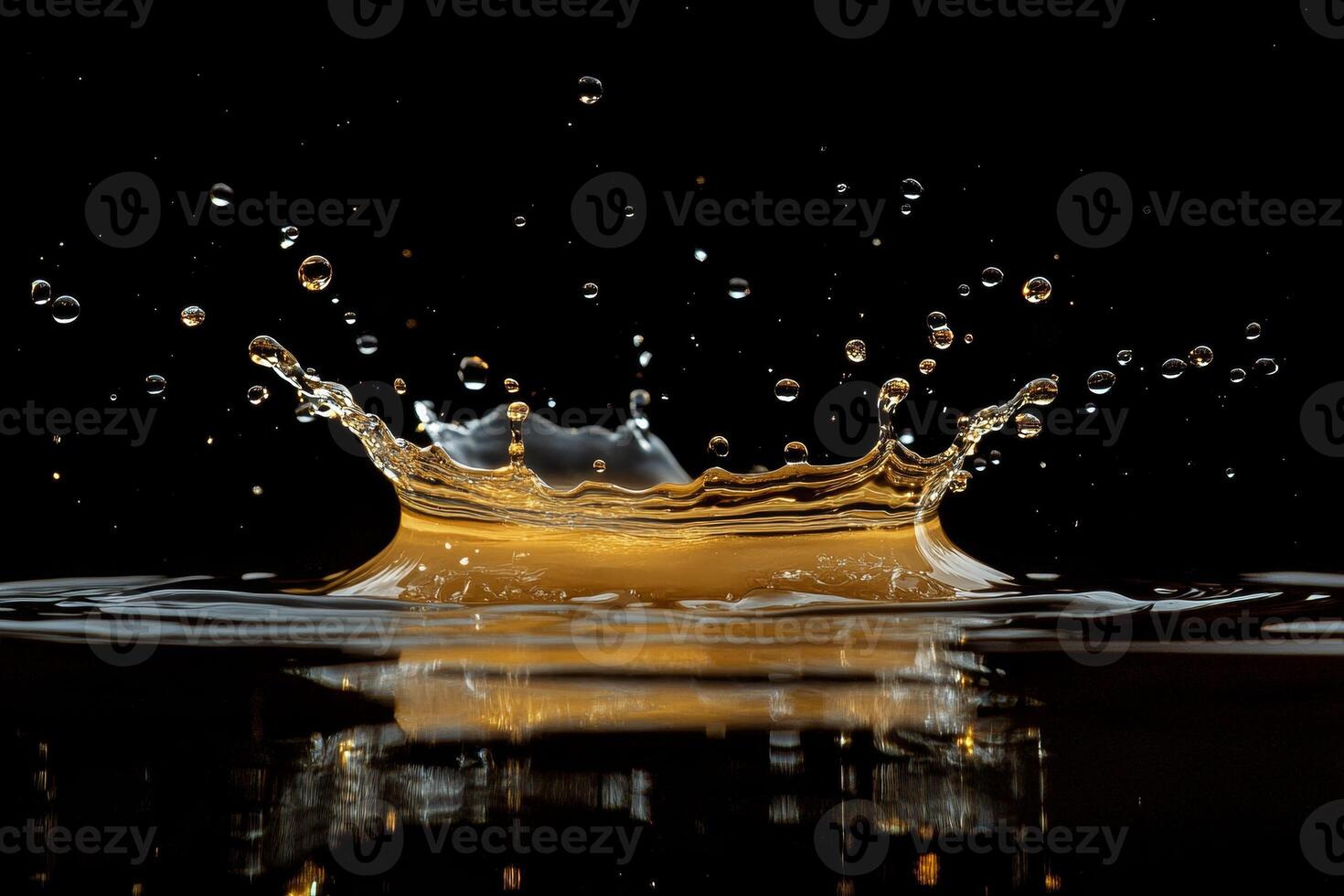 A splash of water is falling from a golden liquid photo