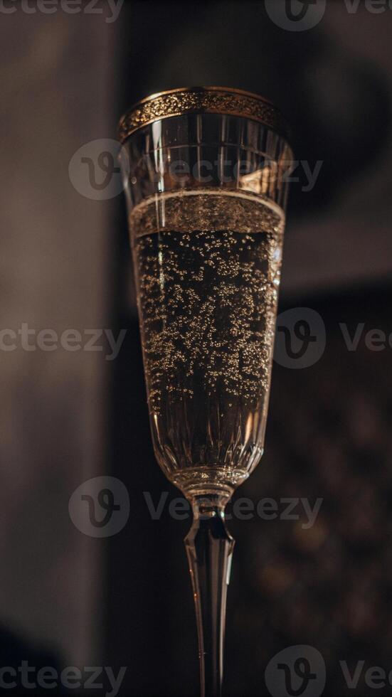 Champagne Flute Close Up with Sparkling Bubbles photo