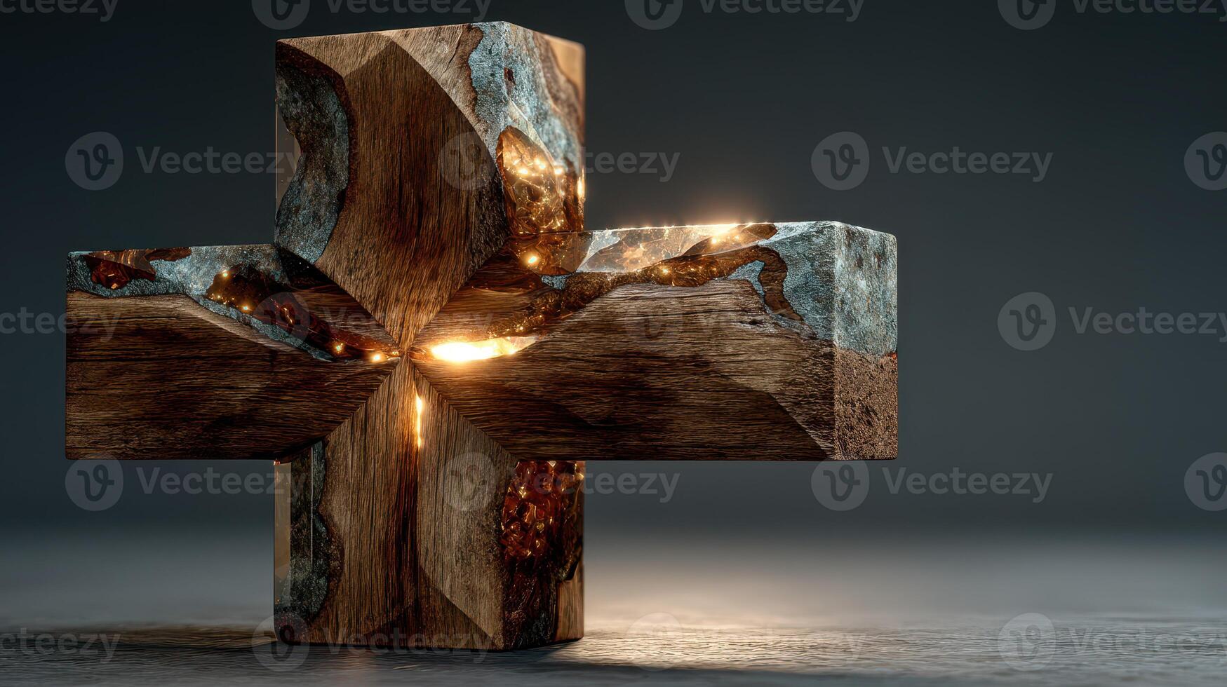 Unique wooden and metal cross sculpture glowing beautifully in a dark space photo