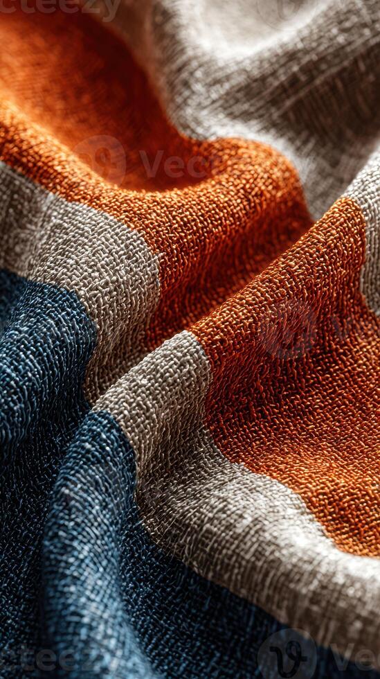 Textured fabric showcases vibrant colors and intricate weaving techniques in close-up view photo