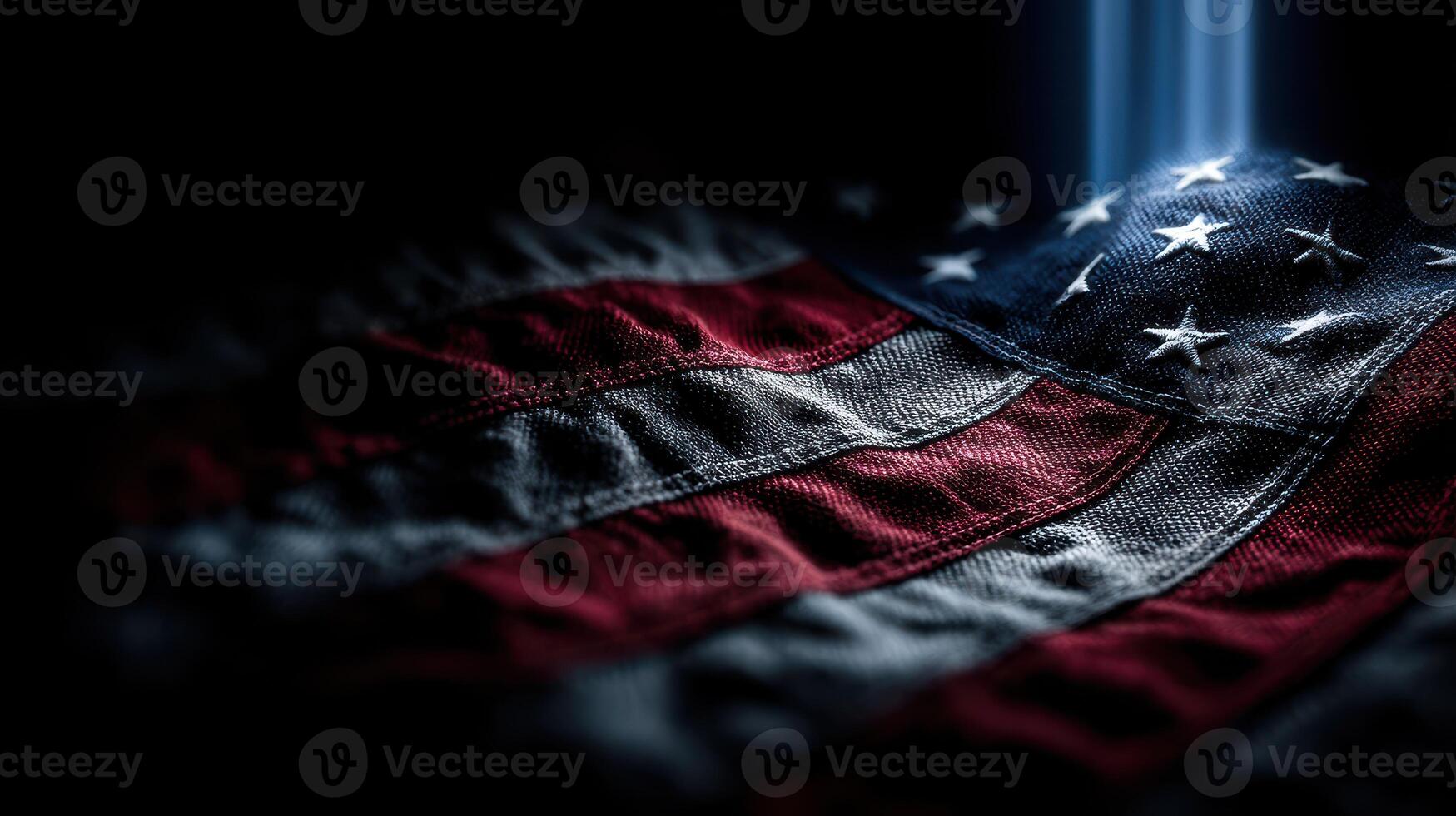 Fabric of patriotism displayed under soft light revealing textures of an American flag photo