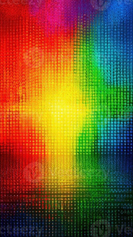Vibrant abstract display of colorful lights creating a mesmerizing rainbow effect on a reflective surface photo