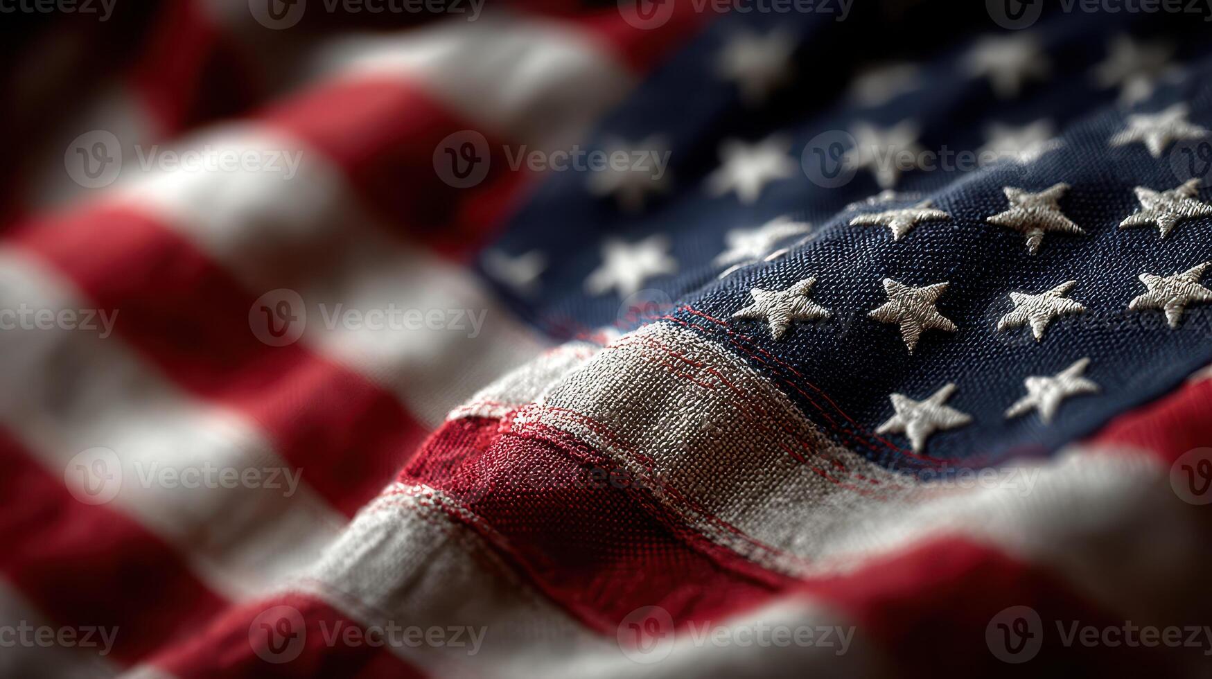 Stars and stripes wave gently, showcasing the red, white, and blue fabric with pride on a sunny day in America photo